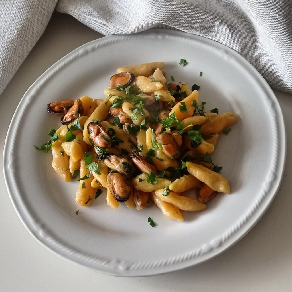 Gnocchi di zucca con cozze | La Tavola di Edda